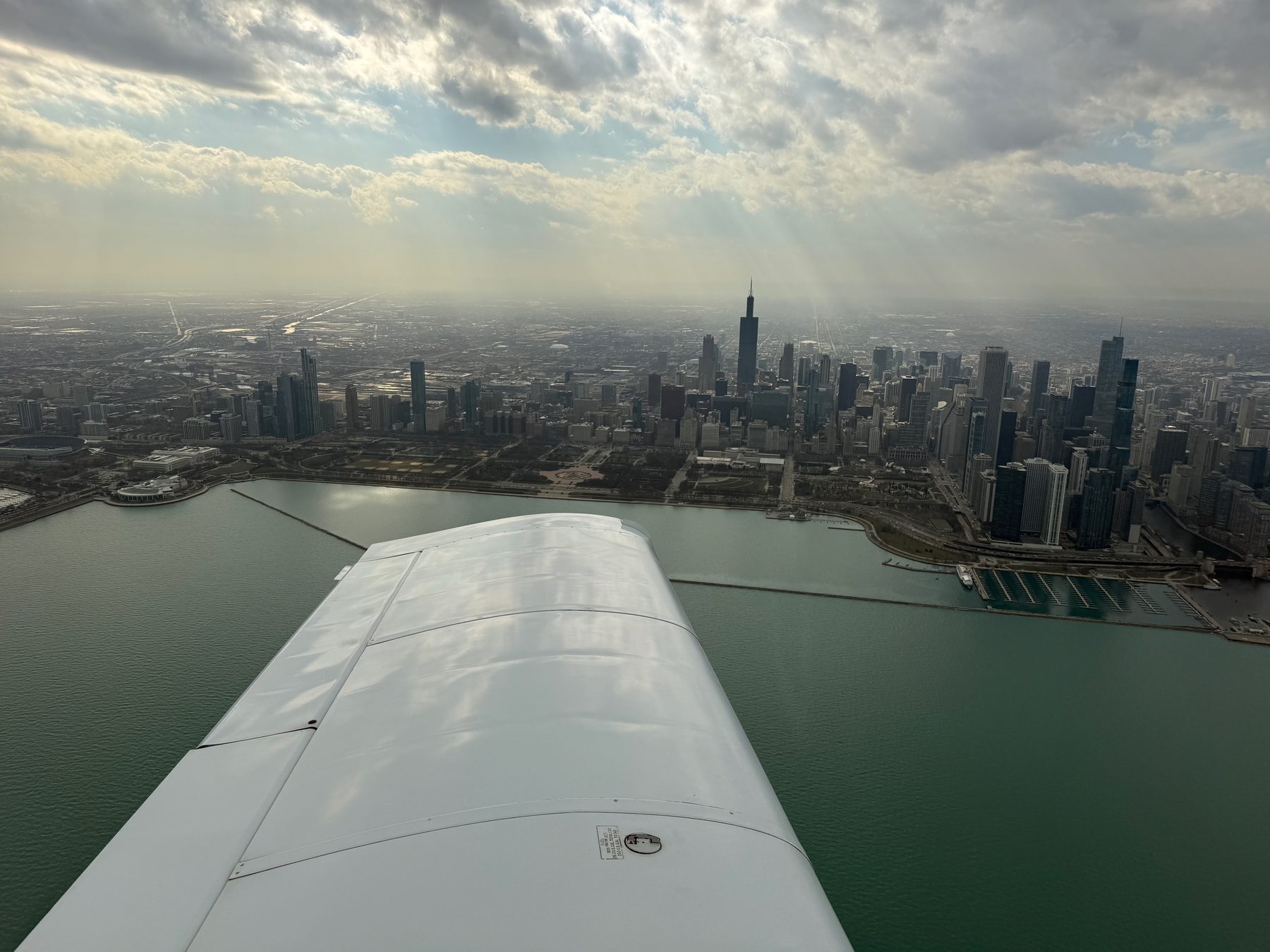N26248's wing over the Chicago skyline
