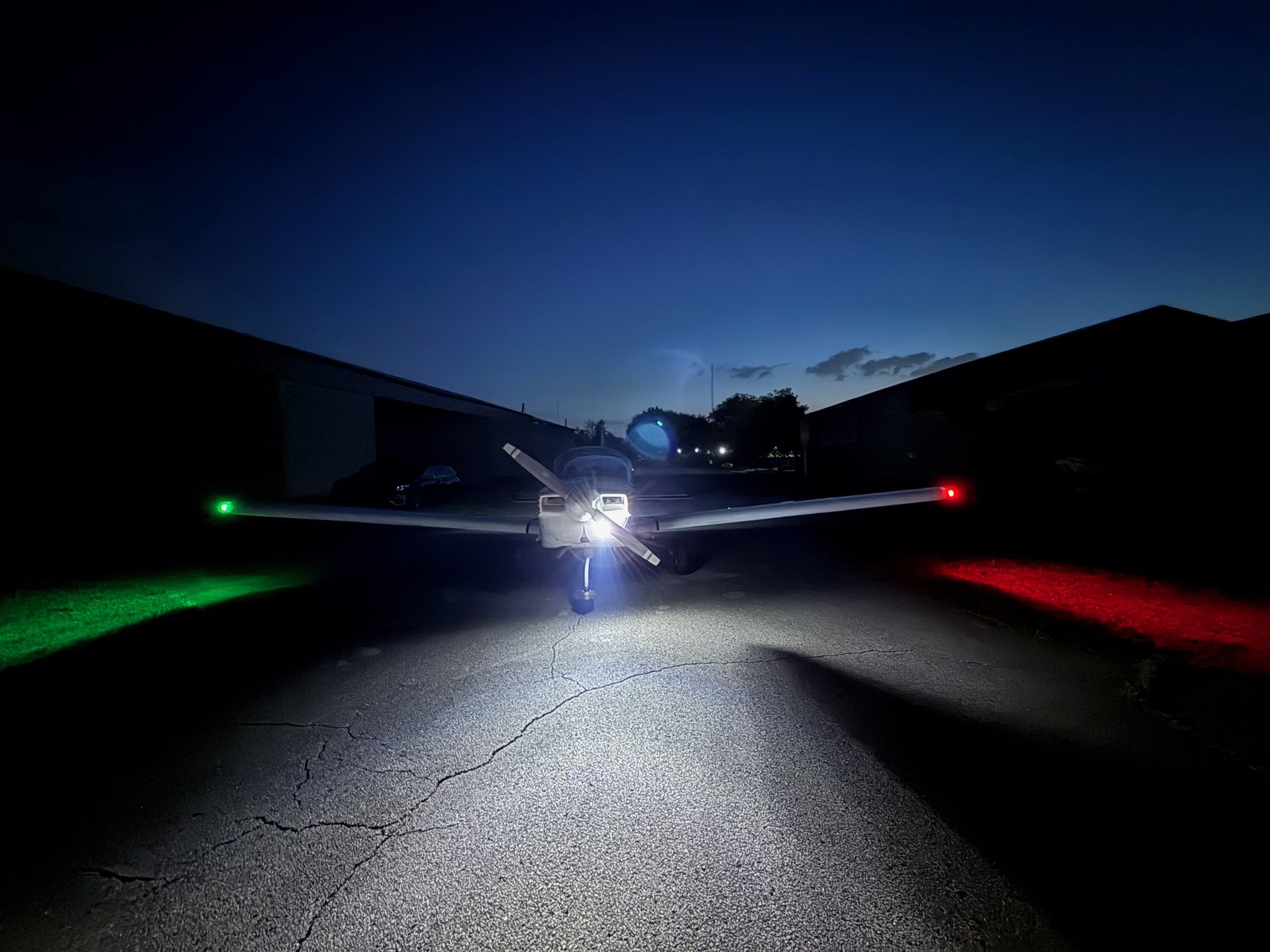 N26248's nav lights glowing green and red at dusk